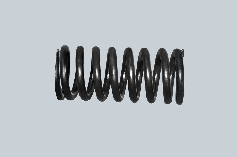 Grinding pressure spring